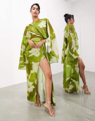 ASOS DESIGN SATIN VOLUME FLARE SLEEVE GRECIAN CUT OUT MAXI DRESS IN GREEN FLORAL-MULTI 