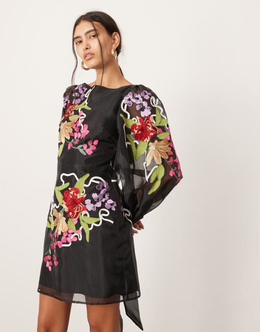 ASOS Edition – Wiązana na plecach czarna sukienka mini z organzy z długim rękawem, haftowanym wzorem i wiązaniem na plecach