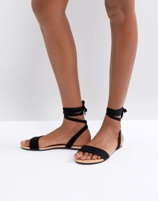 black tie flat sandals