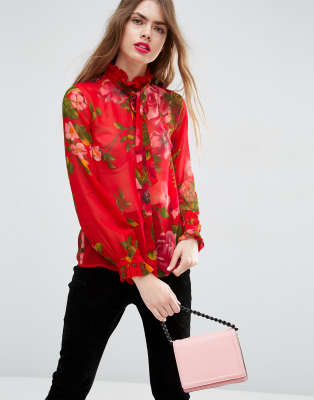 red flowery blouse