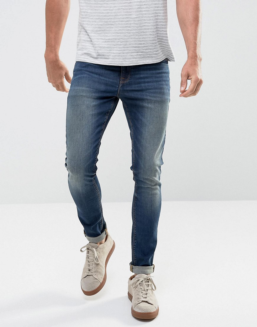 ASOS - Jeans super skinny da 12,5 once lavaggio blu scuro