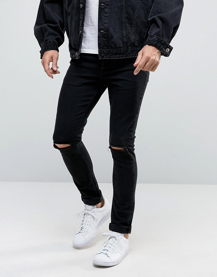ASOS - Jeans super skinny nero puro da 12,5 once con strappi sulle ginocchia