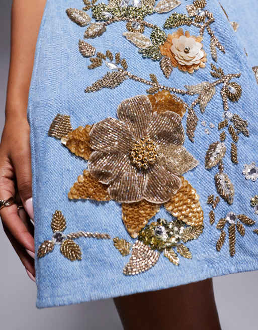 ASOS LUXE 3D floral gold embellished denim bandeau mini dress with cage  skirt in mid wash blue | ASOS