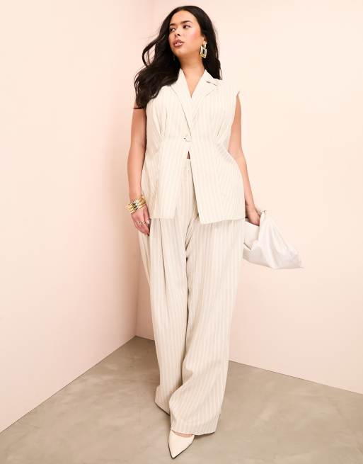 https://images.asos-media.com/products/asos-luxe-curve-linen-mix-longline-sleeveless-tailored-blazer-with-bow-back-in-stripe-print/205953696-4?$n_640w$&wid=513&fit=constrain