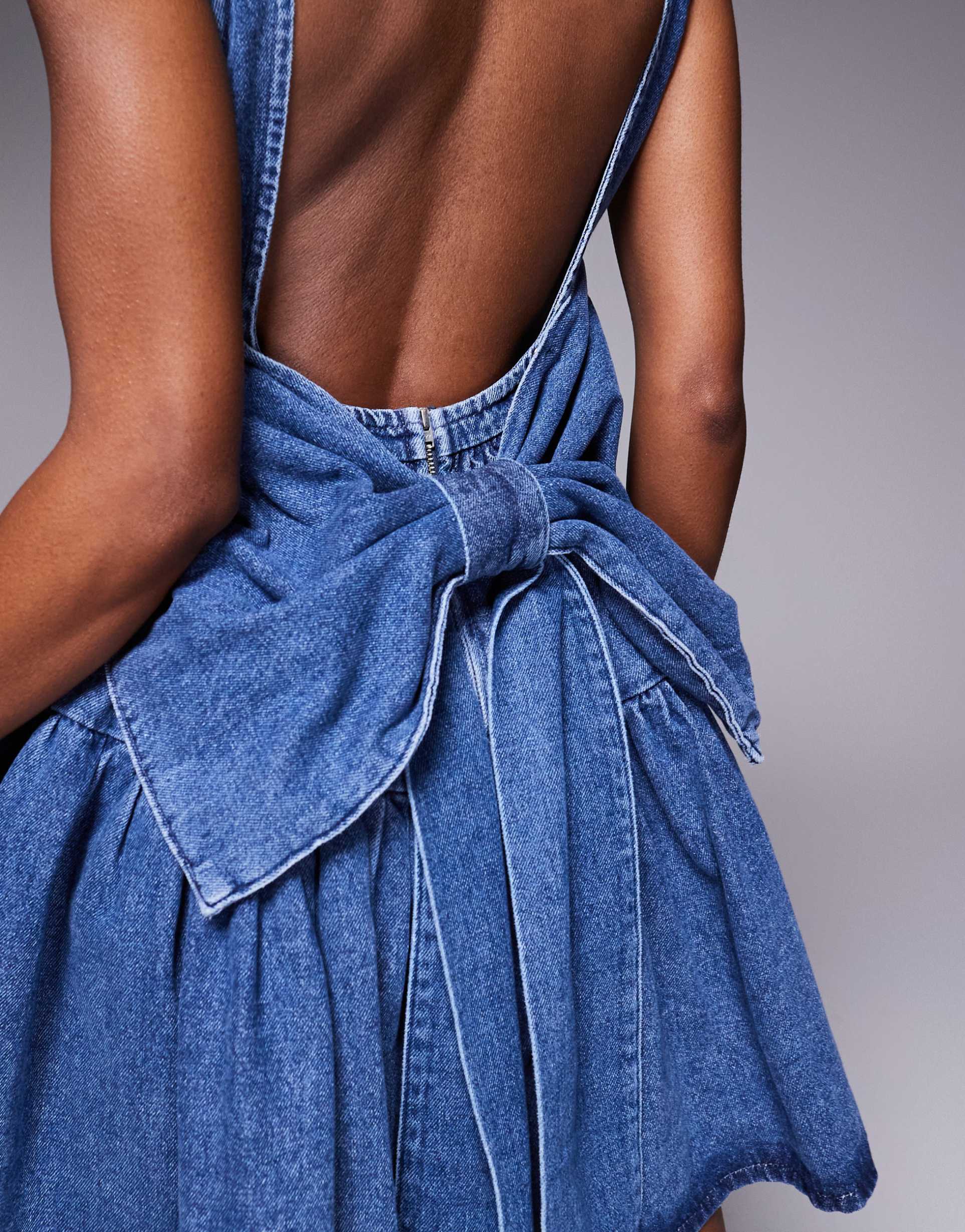 asos luxe denim pleated bust skater dress with bow back in blue
