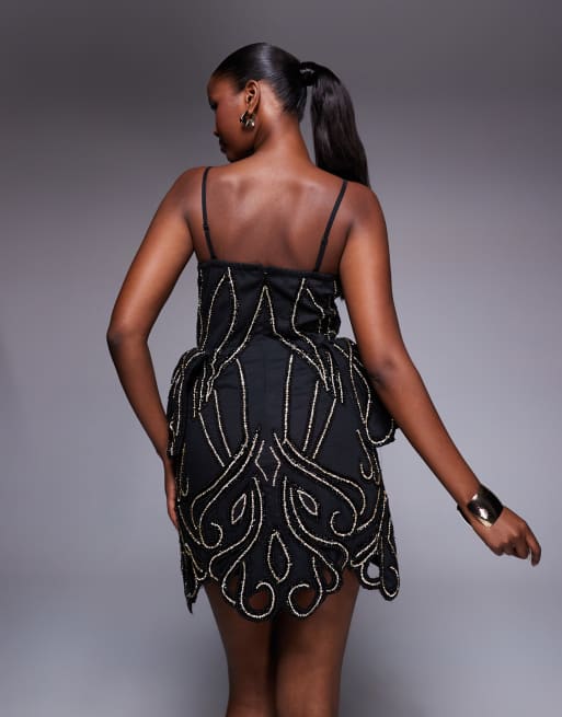 ASOS LUXE embellished mini dress with sculpted detail and cutwork in black  and gold