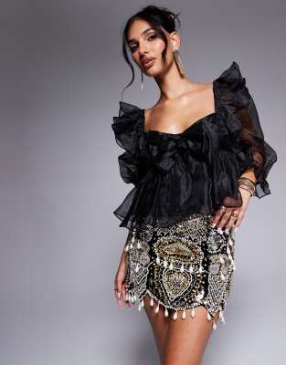 gem embellished velvet mini skirt with drop pearls in black