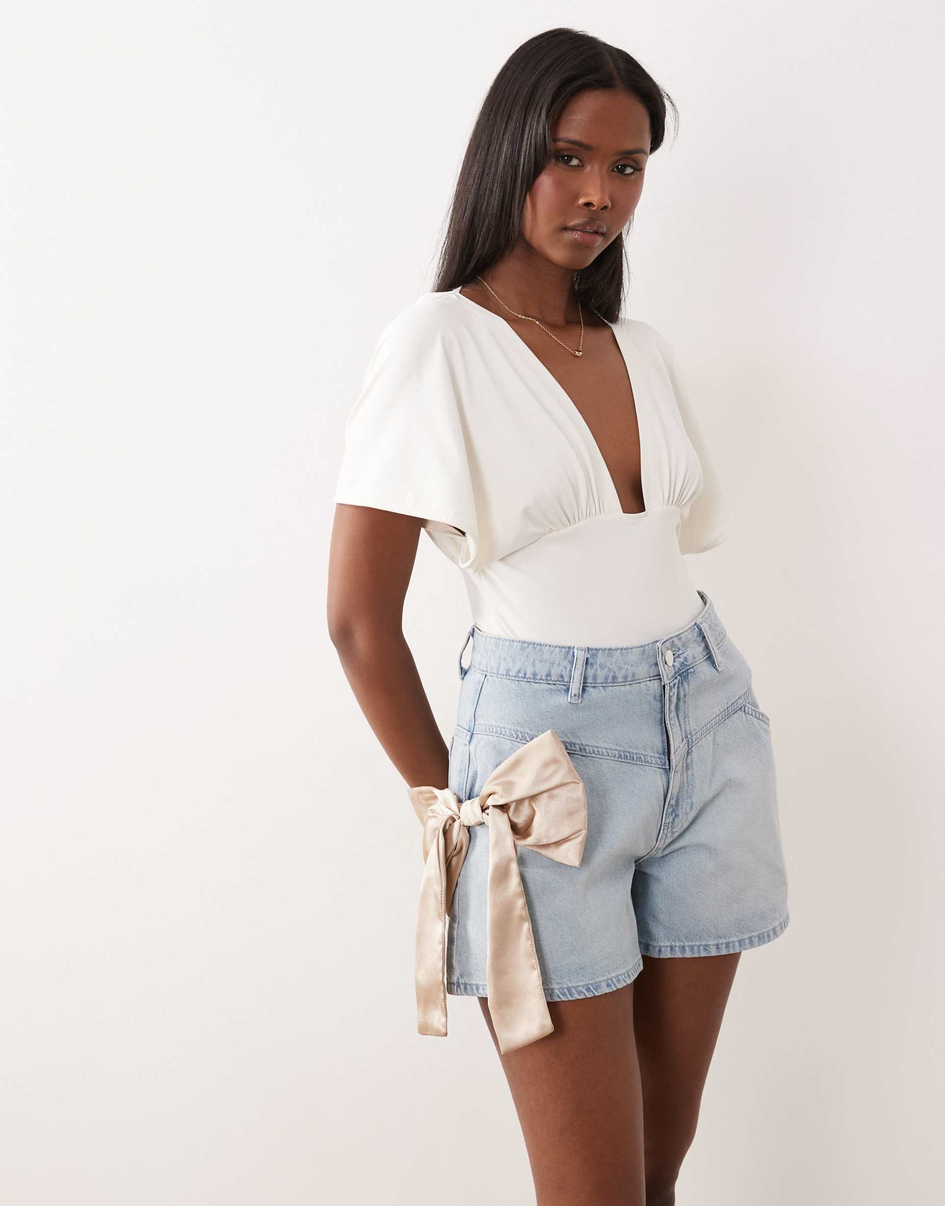 asos luxe high waisted flippy shorts with 3d bow detail in blue