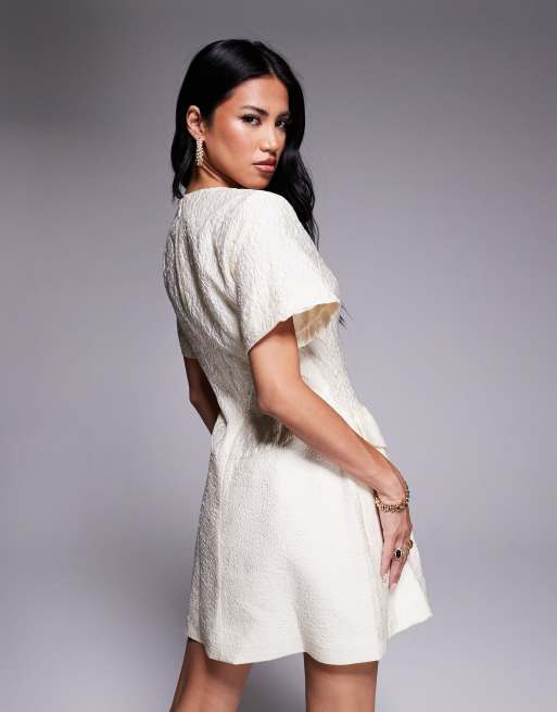ASOS LUXE jacquard sculpted mini dress with embellished buttons in floral