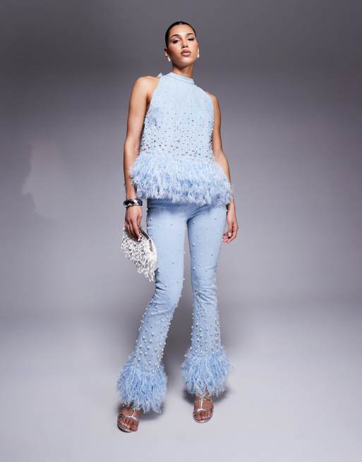 ASOS Luxe - Jeans decorati con perle blu con bordi con in pelliccia sintetica in coordinato