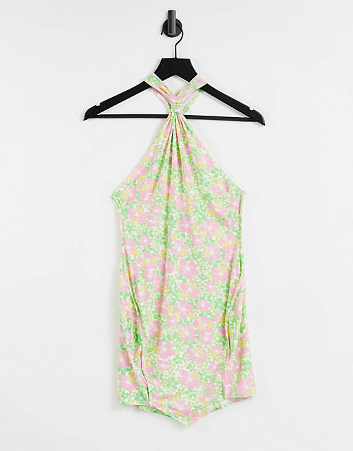 ASOS DESIGN knot halter mini dress with split in 70s floral print