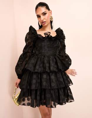 organza tiered polka dot mini dress with blouson sleeve and ruffle detail in black