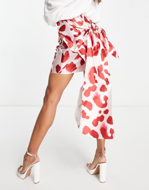 ASOS LUXE – Rosa djurmönstrad minikjol i satin med rosett baktill