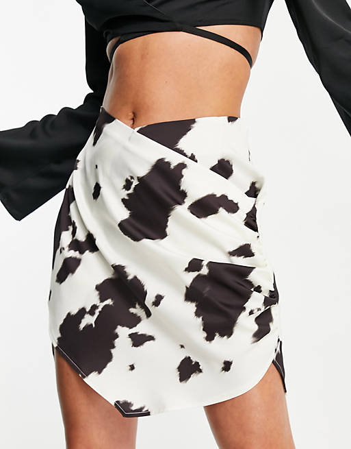ASOS DESIGN satin mini skirt in cow print