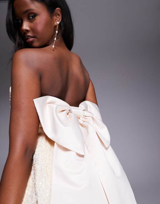 ASOS LUXE  sequin structured mini dress with satin bow in cream