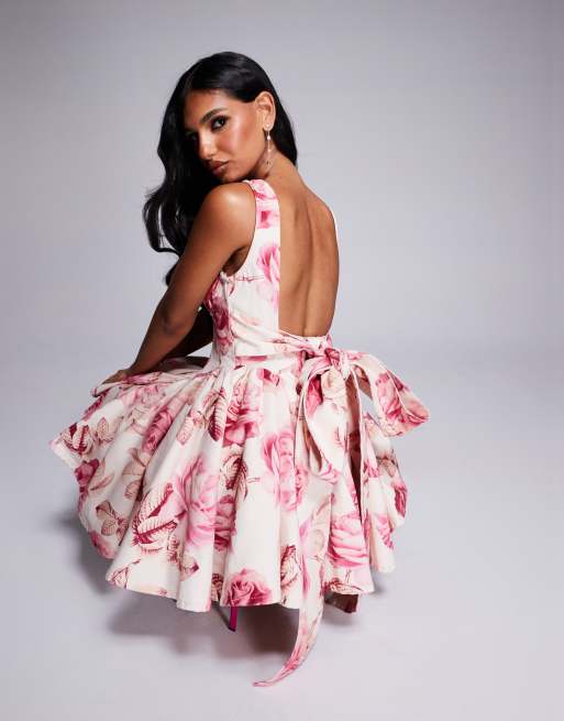 ASOS LUXE - Vestito corto skater in denim con corsetto, fiocco sul retro e stampa a fiori rosa