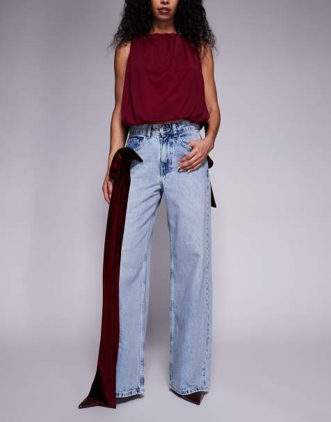 ASOS LUXE wide leg jeans with 3D velvet bow detail in light blue