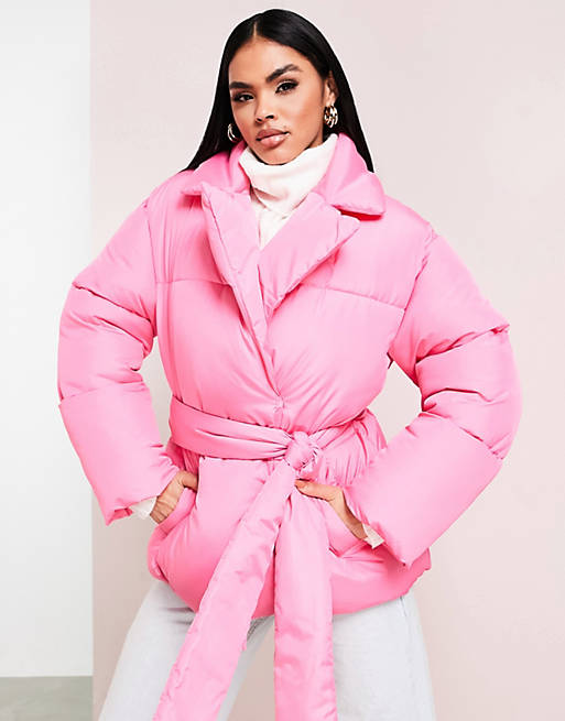 Women wrap puffer coat in hot pink 