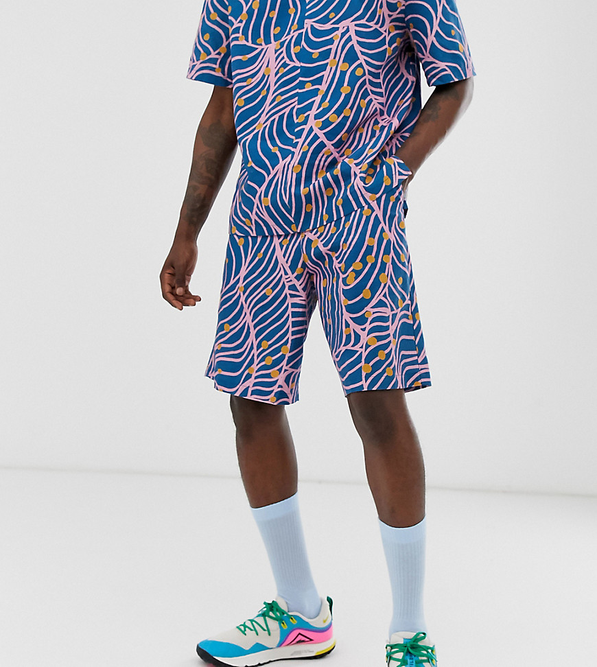 ASOS MADE IN KENYA – Shorts i oversize-modell med klottermönster-Flerfärgad