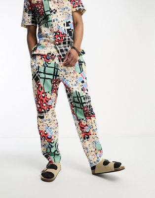 ASOS MADE IN KENYA tapered trouser in cut about graphic print