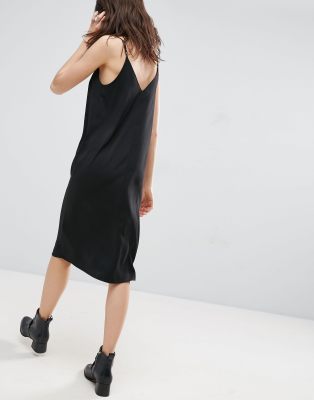 black cami dress with white top