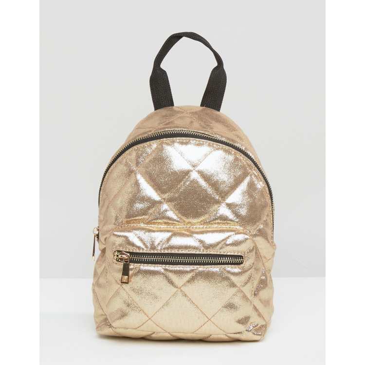 Asos Metallic Mini Backpack, $31, Asos