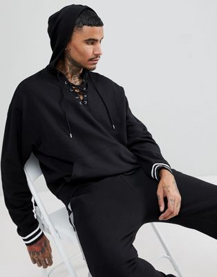 ASOS - Oversized hoodie met vetersluiting in de hals en boorden met gekleurde strepen-Zwart