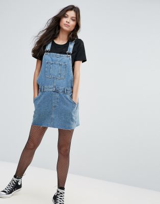 denim dungaree dress with tights