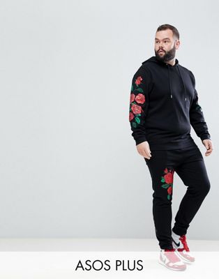 ASOS PLUS - Trainingspak van hoodie en skinny joggingbroek met geborduurde rozenprint in zwart