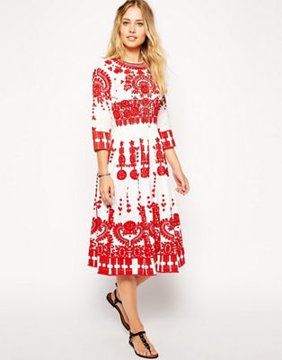 white dress with red embroidery