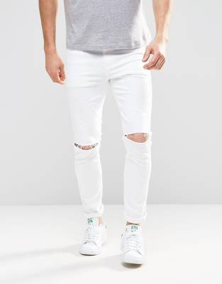 white jeans with knee slits