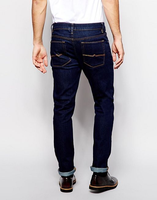 ASOS DESIGN stretch slim jeans in indigo