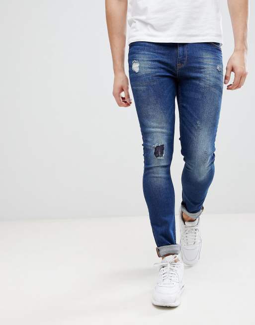 ASOS Super Skinny Jeans In Dark Wash Blue With Abrasions