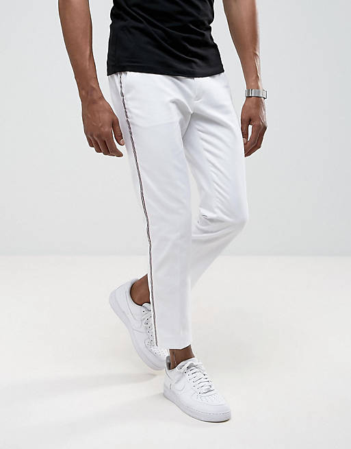 Мужские черно белые штаны. Белые штаны мужские. Белые брюки мужские. Хлопковые брюки мужские. Белые укороченные брюки мужские.