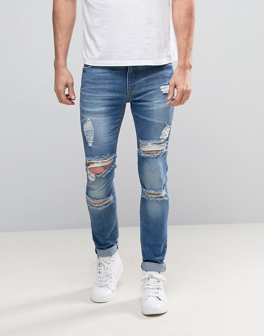 ASOS - Superskinny jeans met megagrote scheuren in middenblauw