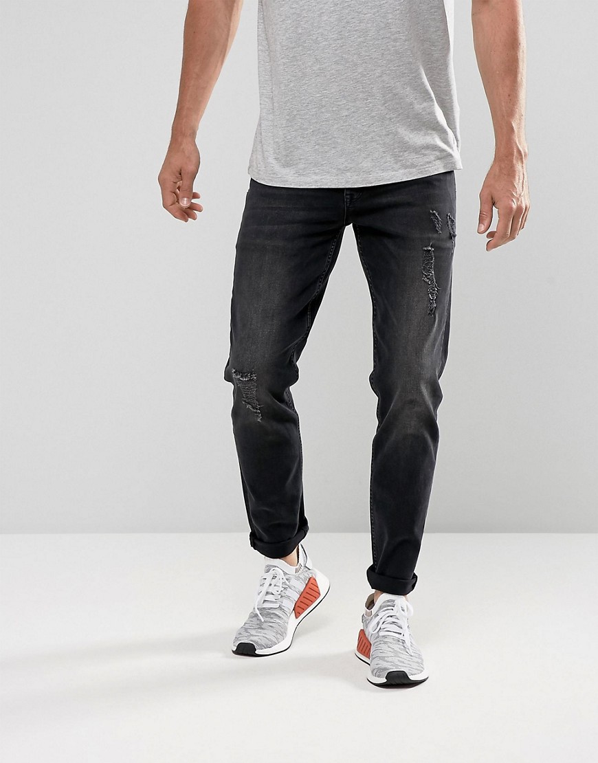ASOS – Svarta, tvättade jeans med slitningar och smal, stretchig passform