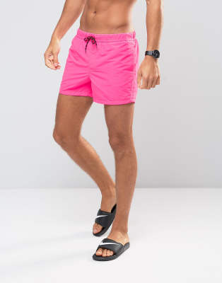 neon pink swim shorts