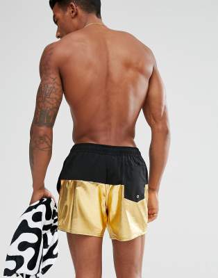 gold swimming trunks