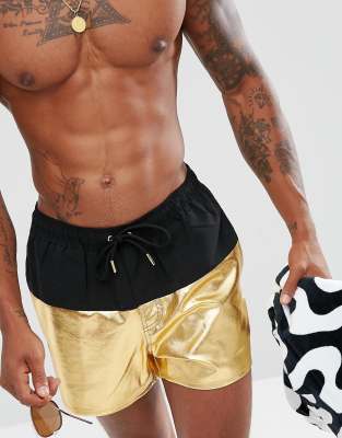 gold swimming shorts