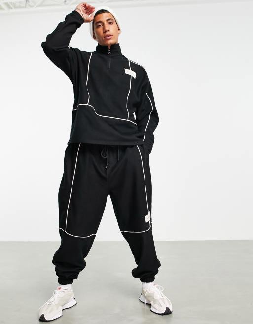 ASOS Unrvlld Spply co-ord oversized polar fleece joggers with piping ...