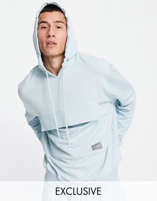 ASOS Unrvlld Spply co-ord relaxed hoodie with logo print and front pocket in blue - ASOS Price Checker