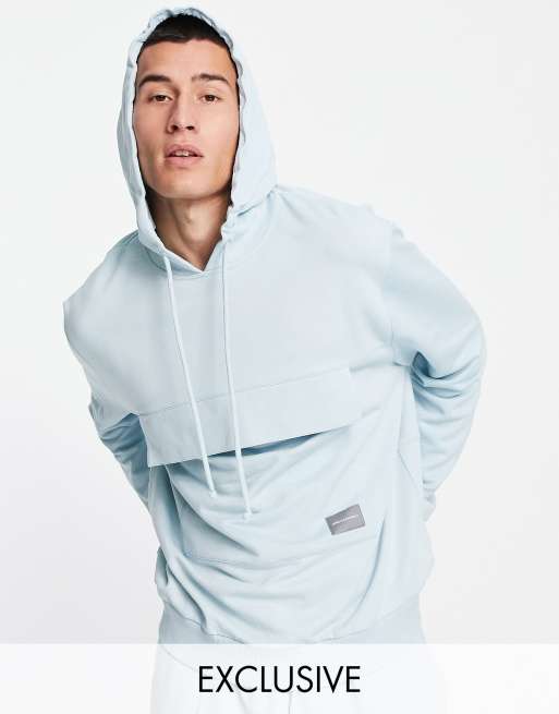 ASOS Unrvlld Spply co-ord relaxed hoodie with logo print and front pocket in blue