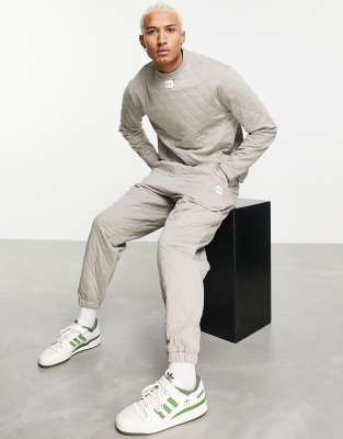 ASOS Unrvlld Spply co-ord relaxed quilted joggers with logo tab - ASOS Price Checker