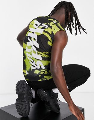 ASOS Unrvlld Spply muscle vest in power mesh in all over print in lime green - ASOS Price Checker