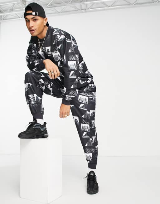 ASOS Unrvlld Spply – Dres z logo i fotograficznym nadrukiem na całej powierzchni