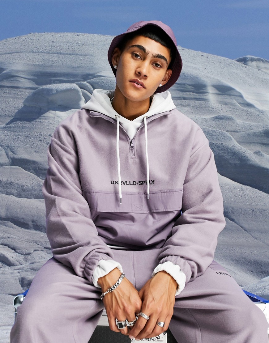 ASOS Unrvlld Spply oversized polar fleece halfzip sweatshirt with nylon pocket & logo print-Purple