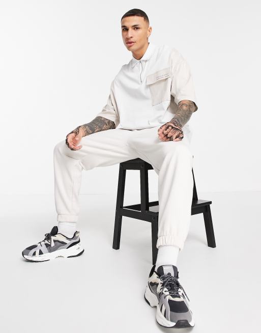 ASOS - Unrvlld Spply - Oversized polo met korte rits, cut-and-sew en logoprint, 4 van 4