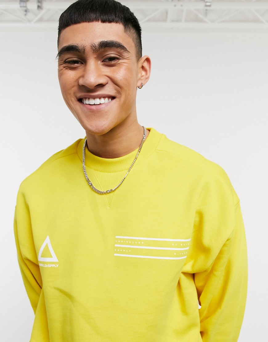 ASOS Unrvlld Spply oversized sweatshirt with chest logos in yellow