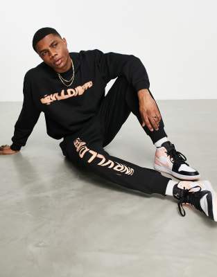 ASOS Unrvlld Spply oversized sweatshirt with large logo print in black - part of a set