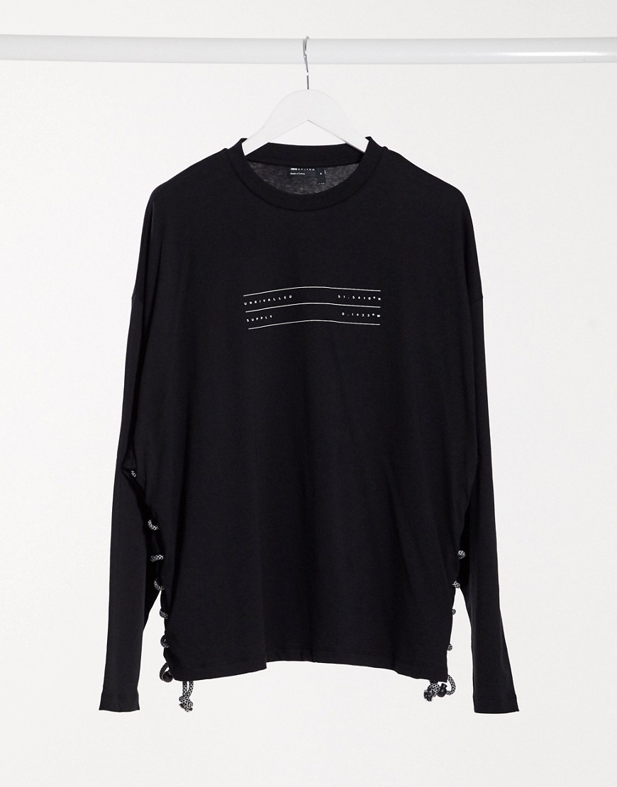 Asos - Unrvlld Spply - Oversized T-shirt met lange mouwen, Unrvlled Supply logoprint en veterdetail aan de zijkant-Zwart